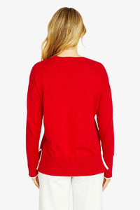 Red cotton cashmere pullover back view with almond contrast tipping on hem and seams