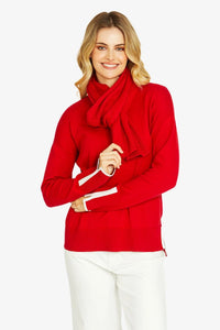 PING PONG Tessa red pullover with white pants and coordinating knitted scarf